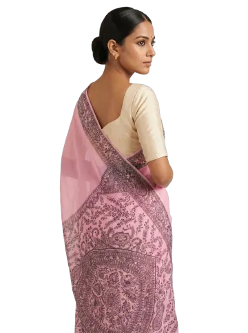 Pink Madhubani chiffon saree draped over the shoulder